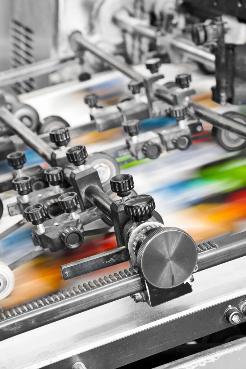 Close up of an offset printing machine during production